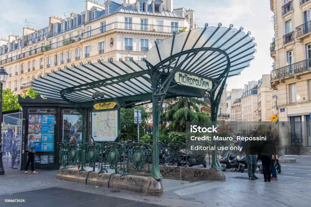 People Walking In A Small Square Next To An Art Nouveau Entrance To A Paris  Metro Station At Paris City France Stock Photo - Download Image Now - iStock