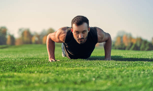 istock The man pushing up on the grass 1086683206