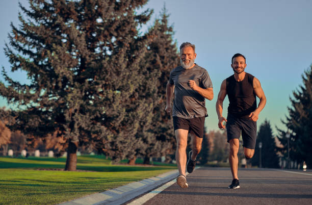 istock The father and son running on the road 1086683332