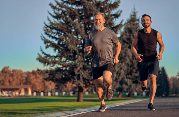 istock The happy father and son running on the road 1086683364