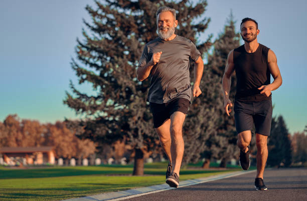 istock The happy father and son running on the road 1086683374