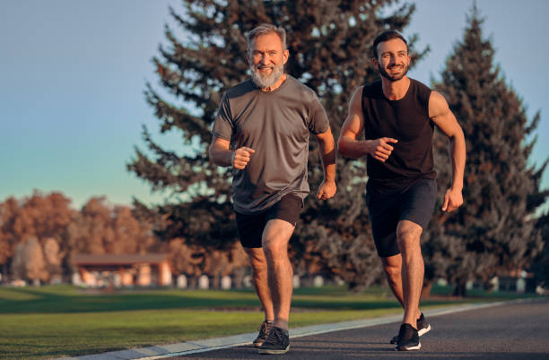 istock The happy father and son running on the road 1086683376