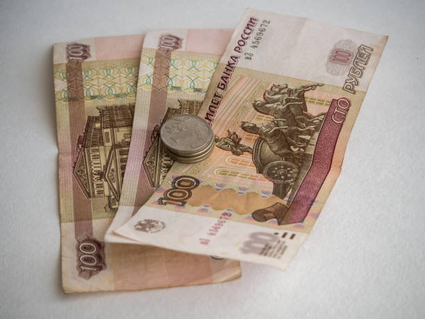 istock Russian paper money and coins 1086689540