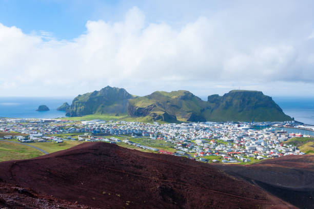 istock Heimaey town aerial view from Eldfell volcano. 1086691628