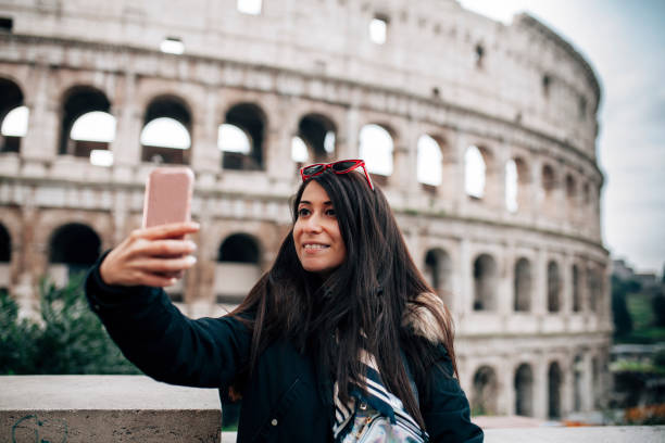 istock Woman taking selfie at colosseo, Rome 1086695090