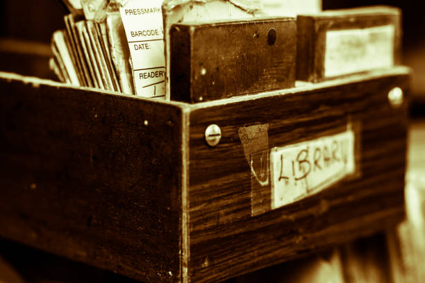 many vintage slides stored in a metal box, isolated on white