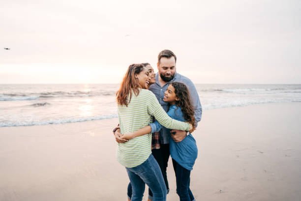 istock Sunset at the beach with family 1086724066