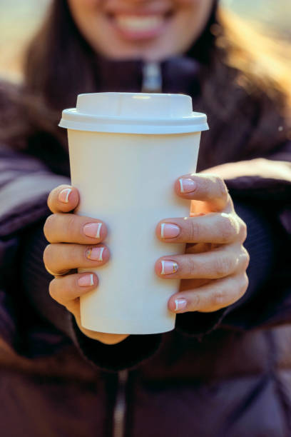 istock Girl with coffee. 1086725410