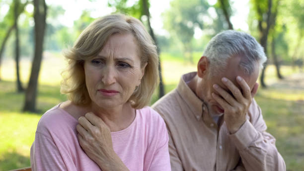 istock Old couple crying, frustrated with illness of close relative, problems despair 1086728390