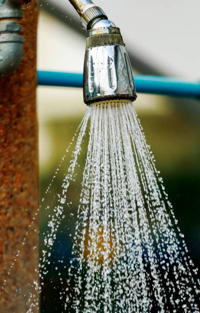 istock Water flows out of the old shower. 1086740132