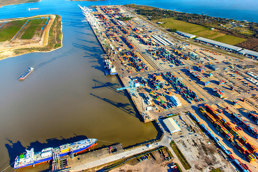 Norfolk Virginia - January 5 2024: Aerial View of a Large Rail Yard Leading out to a Coal Pier in Norfolk Virginia