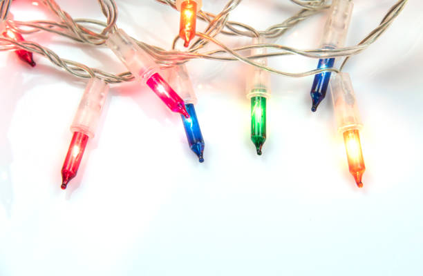 istock Christmas lights ornaments isolated on white background 1086760322