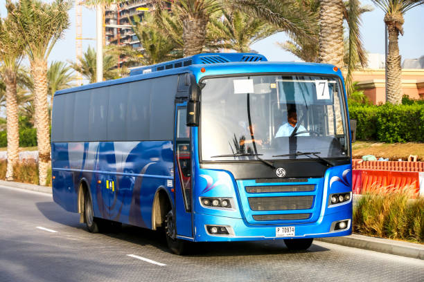 Ashok Leyland Falcon Dubai, UAE - November 16, 2018: Blue coach bus Ashok Leyland Falcon in the city street. coach bus photos stock pictures, royalty-free photos & images