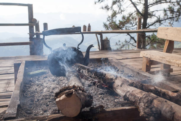 istock Old kettle is heated on firewood 1086787826