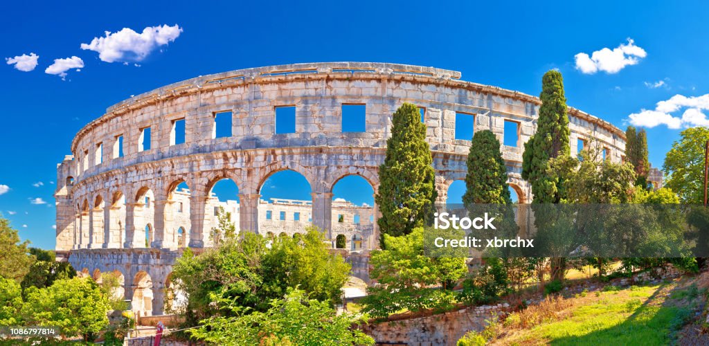 Arena Pula historic Roman amphitheater panoramc green landscape view, Istria region of Croatia Pula - Istria Stock Photo
