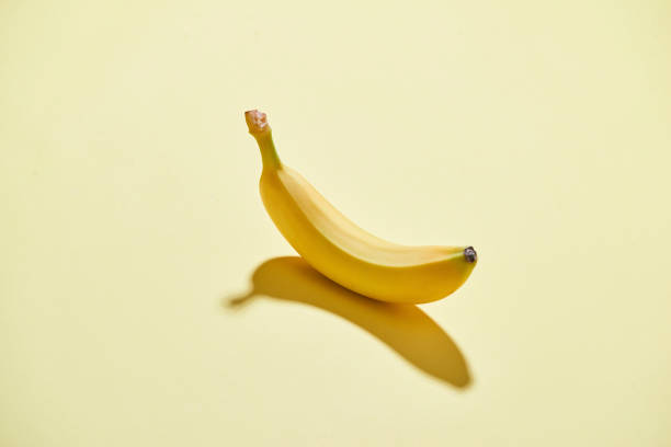 istock Sweet banana on the yellow background 1086803352