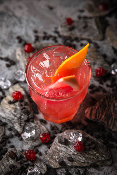 istock Alcoholic or non-alcoholic grapefruit, citrus, berry cocktail with liqueur, vodka, champagne or martini. Cool drink. 1086805348