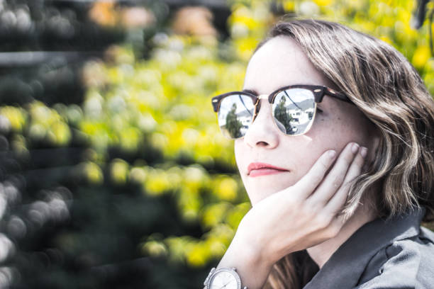 istock Young modern woman with sunglasses and casual expression 1086805456