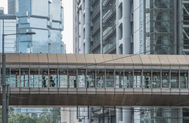 istock Pedestrian crossing bridge among skyscrapers 1086808346