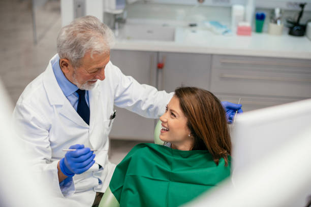 istock Young woman at the dentist 1086812626