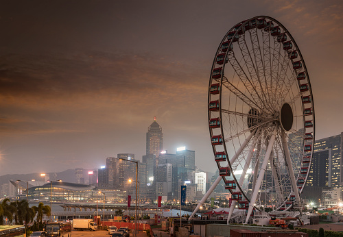 Hong Kong Island. The Hong Kong Observation Wheel is a 60-meter tall Ferris wheel located on the Central & Wan Chai district overlooking Victoria Harbour.