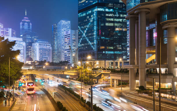 istock Traffic in a modern city at night 1086821444