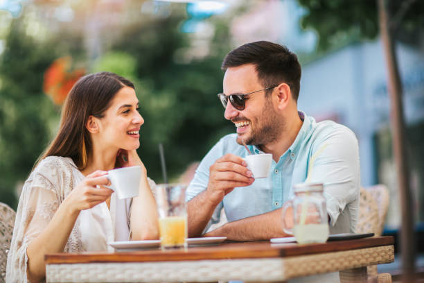 istock Beautiful couple having coffee on a date 1086822820