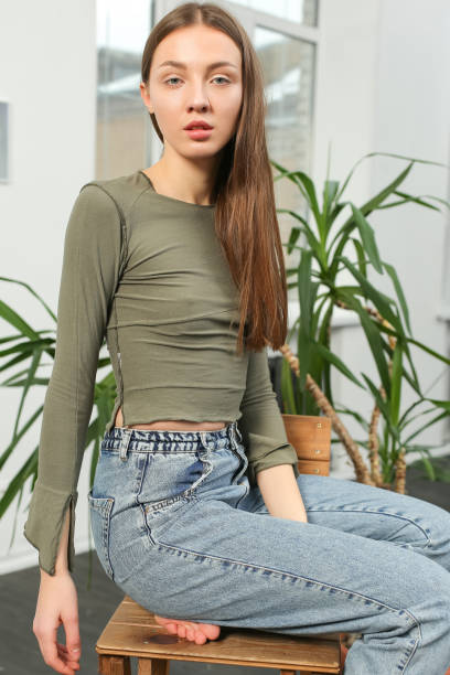 istock seductive slim woman on chair 1086824856