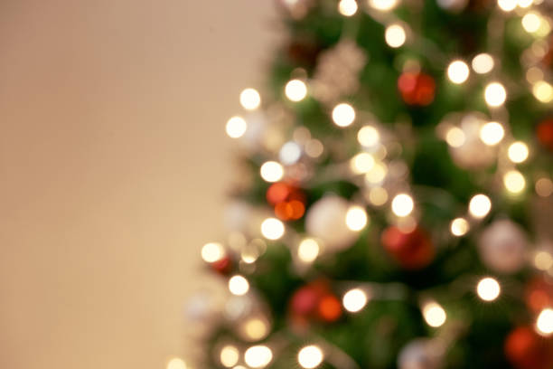 istock Decorated Christmas tree on blurred, sparkling and fairy background 1086829994