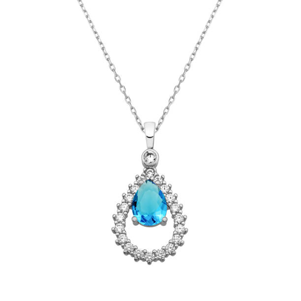 Drop shape necklace with zircon and drop aquamarine gemstone stock photo