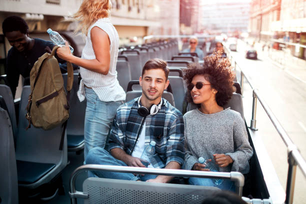 istock Open Top Bus Tour In The City 1086839338