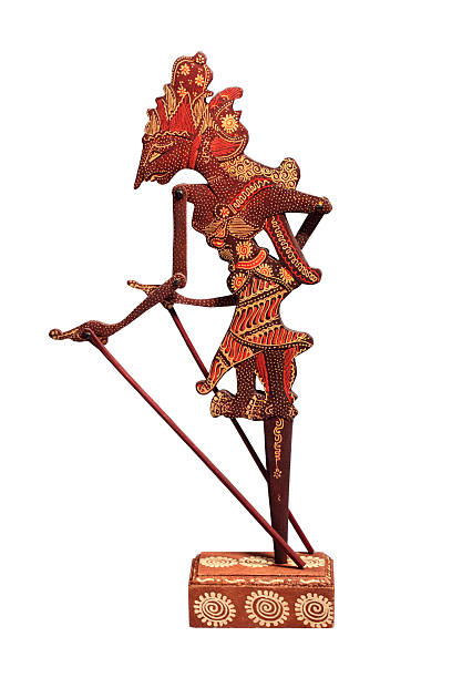 Traditional marionette Wayang Kulit. Indonesian Indonesian flat wayang shadow puppet isolated on white with clipping path wayang kulit stock pictures, royalty-free photos & images