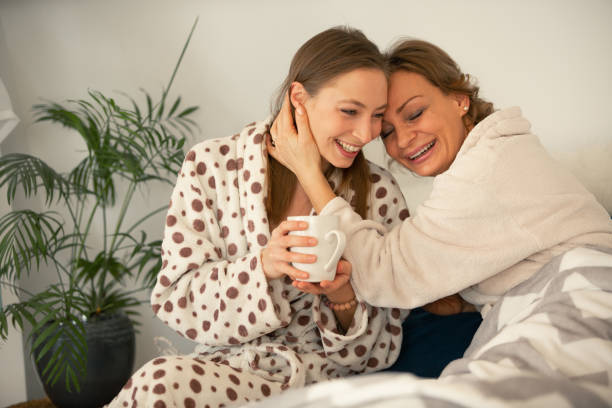 istock Affectionate mother and daughter relaxing in the morning 1086845240