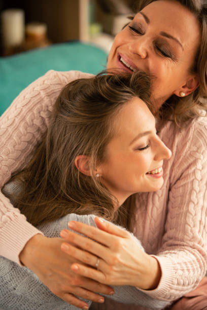 istock Happy mother and daughter hugging 1086845866