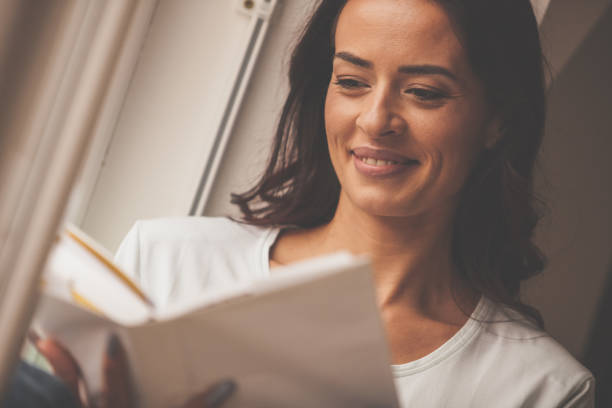istock Woman enjoying a good story 1086848002