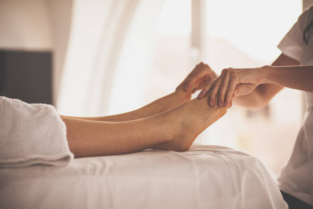 istock Woman having a foot massage at spa 1086849554