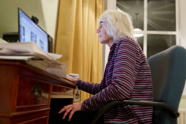 istock Old elderly senior person learning computer and online internet skills protect money scam and fraud 1086849898