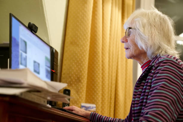 istock Old elderly senior person learning computer and online internet skills protect money scam and fraud 1086849928