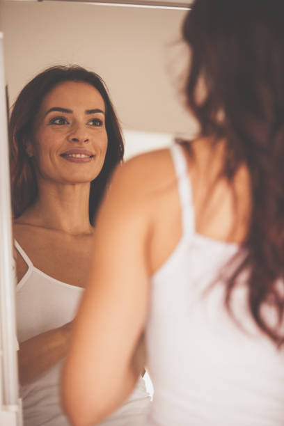 istock Woman satisfied with her look 1086851926