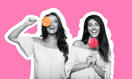 Magazine style collage of two young women having fun with lollipops, grimacing on pink background, happiness and joy