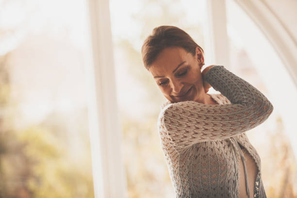 istock Mature woman dancing in her apartment 1086854184