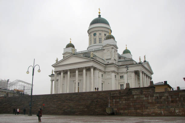 istock Cathedral on Senate Square in Helsinki, Finland. Side view. People walk around. 1086860228