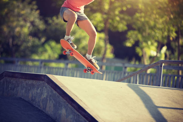istock Skateboarder skateboarding at skatepark 1086862060