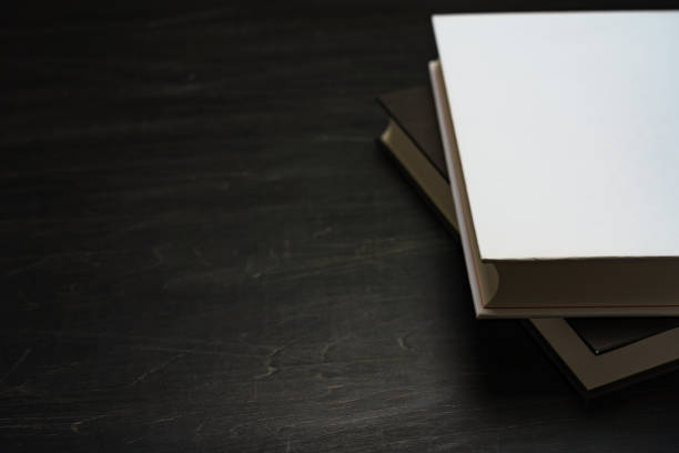 istock Blank hard cover book template on black background 1086864804