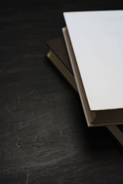istock Blank hard cover book template on black background 1086864826