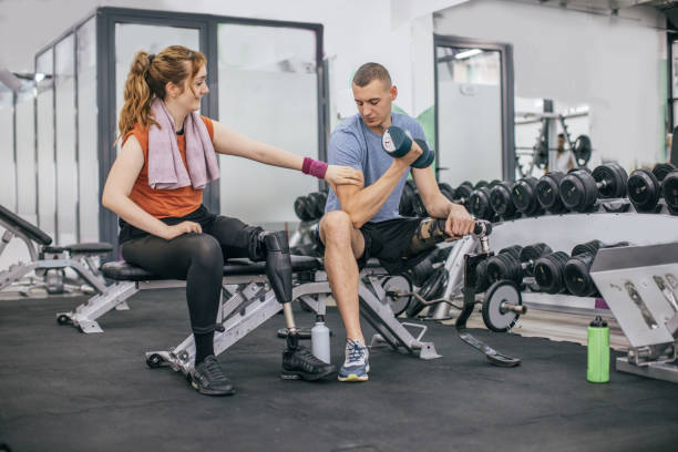 istock Disability friends exercising in gym 1086866604