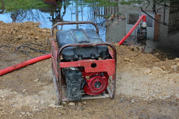 istock Petrol water pump with metal frame pumping water 1086870758