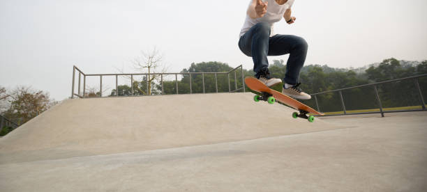 istock Skateboarder skateboarding on skatepark 1086881930