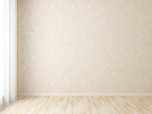 istock Empty room with wooden floor and beige wall 108688400