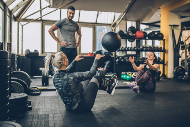 istock Girls practicing together while fitness coach is watching them 1086884678